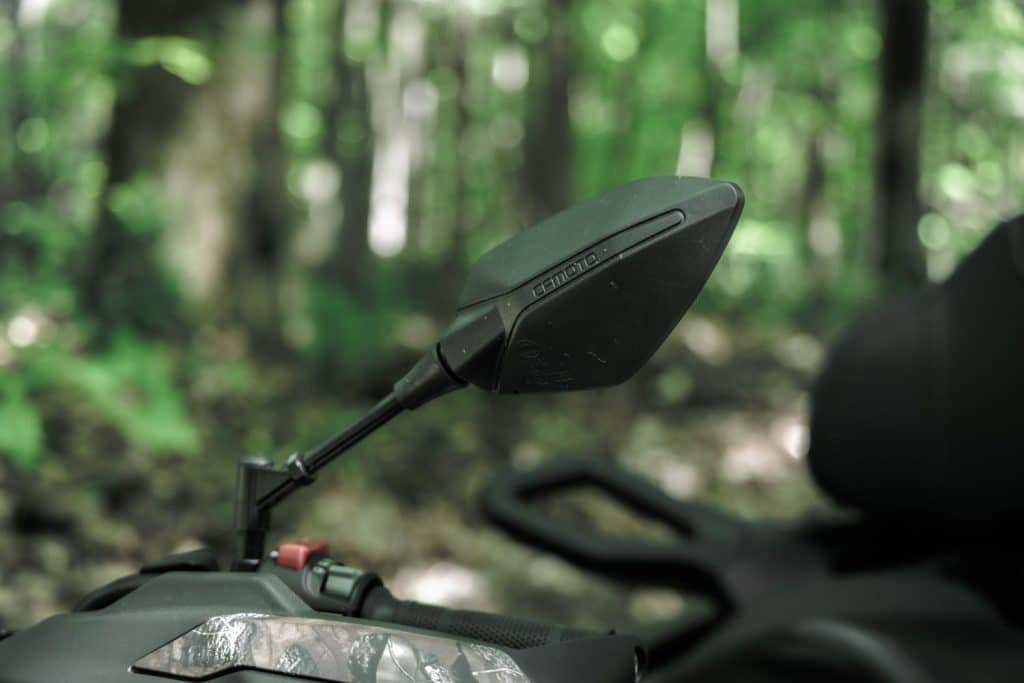 CFMOTO CFORCE 600 Touring 2024 test drive on a rugged trail.